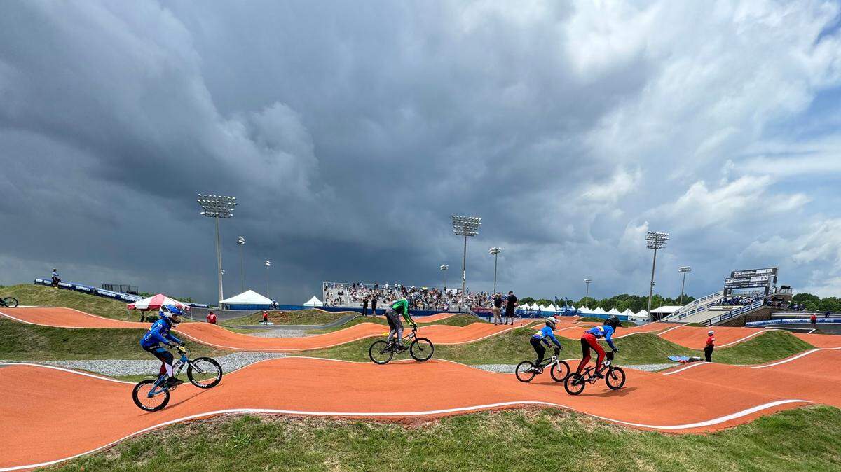 Large storm clouds blanket Rock Hill as BMX racers practice Friday at the Rock Hill BMX Supercross Track.