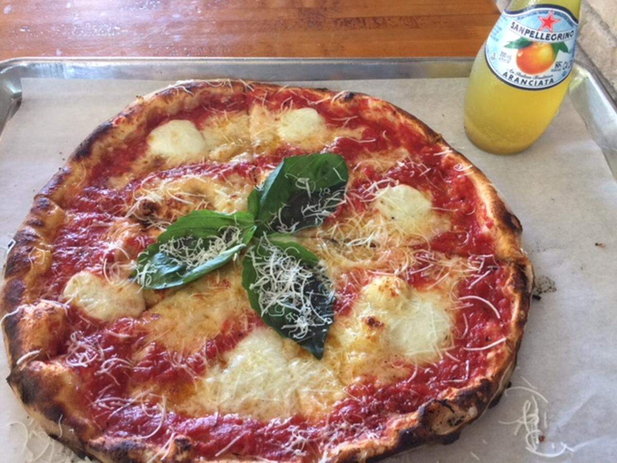 DeSano's margherita has Italian scamorza cheese (a dry mozzarella), buffalo mozzarella and shreds of pecorino.