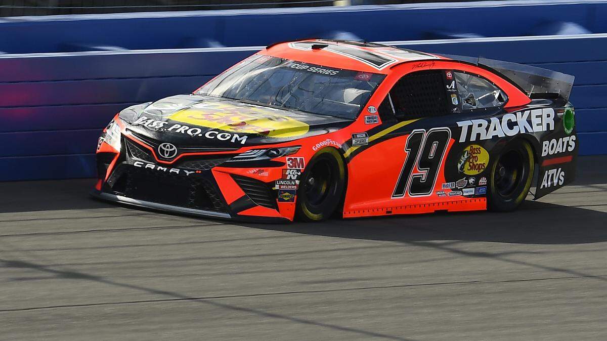 Martin Truex Jr., driver of the Bass Pro Shops Toyota, practices for the Monster Energy NASCAR Cup Series Auto Club 400 in Fontana, Calif., last week. Truex is one of our two picks to win at Phoenix on Sunday.