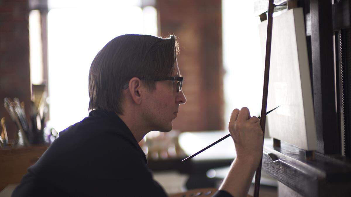 Artist Chris Clamp works in his studio at the McColl Center for Art + Innovation in uptown Charlotte. Clamp is one of six artists in residence this summer at the McColl Center.