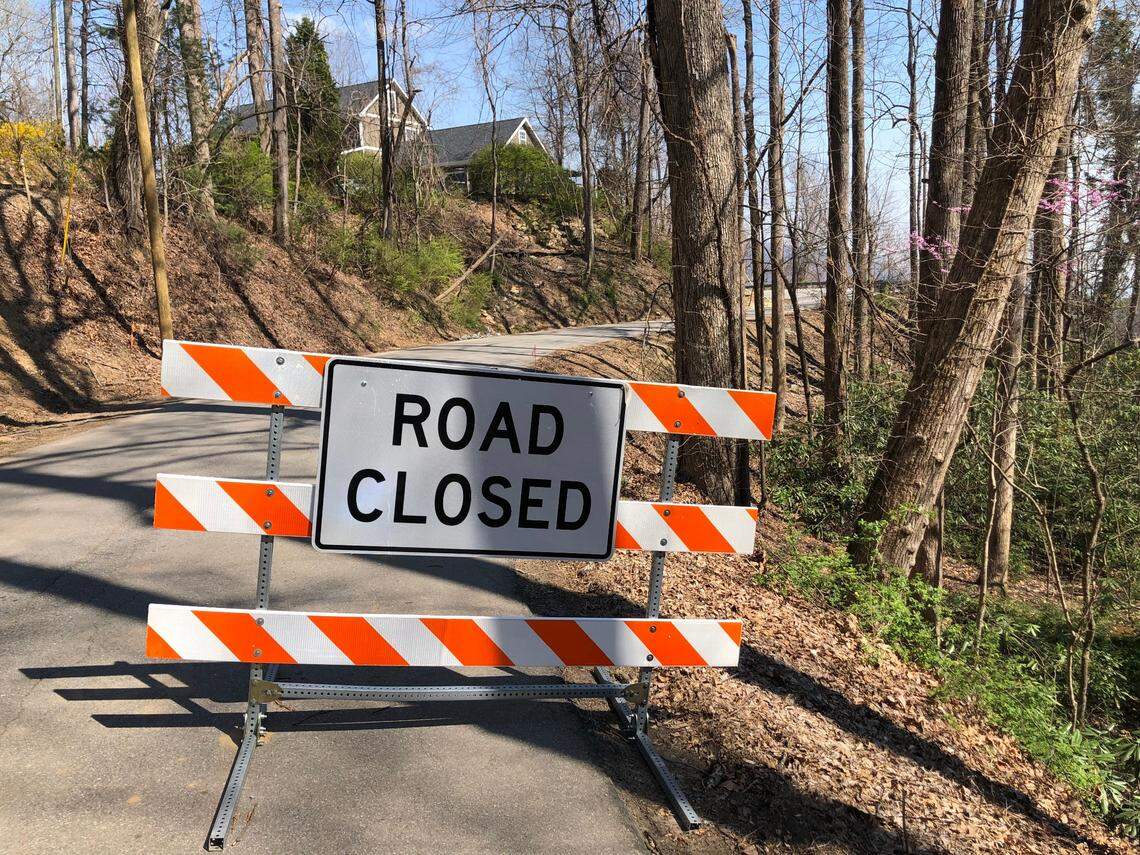 Green River Cove Road in Saluda, N.C., was closed to traffic on Thursday, March 27, 2025 due to fires in the area.