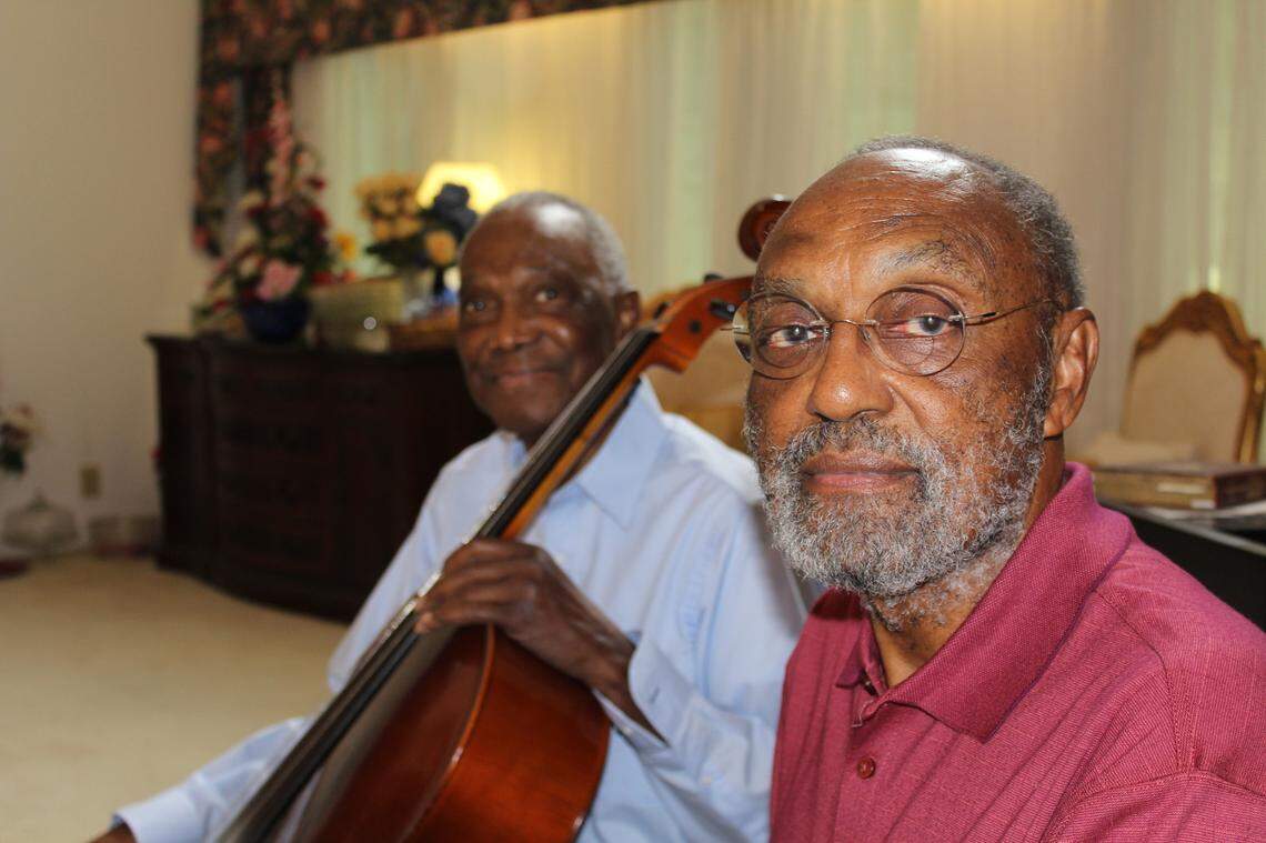 In 1963, violinist Leroy Sellers and cellist Samuel C. Davis were the first Black musicians to integrate the Charlotte Symphony. The men are seen here in an undated photo.
