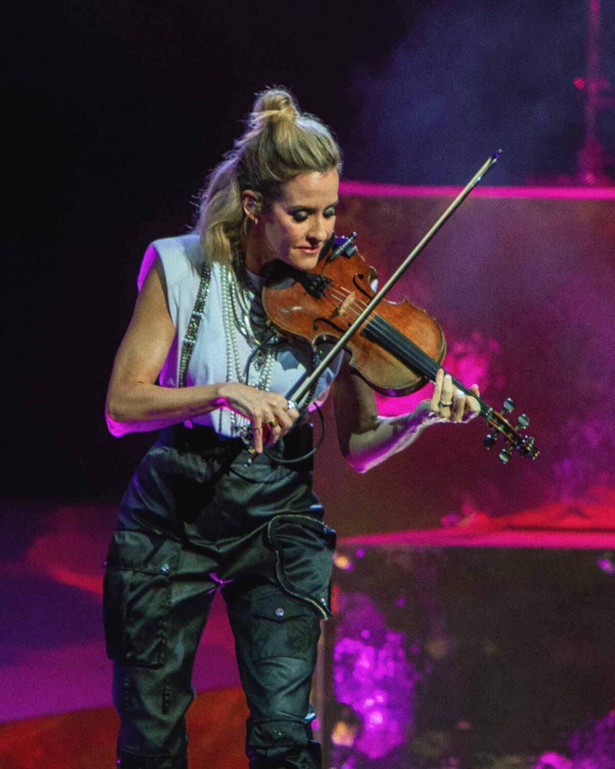 The Chicks’ Martie McGuire plays the violin at PNC Music Pavilion.