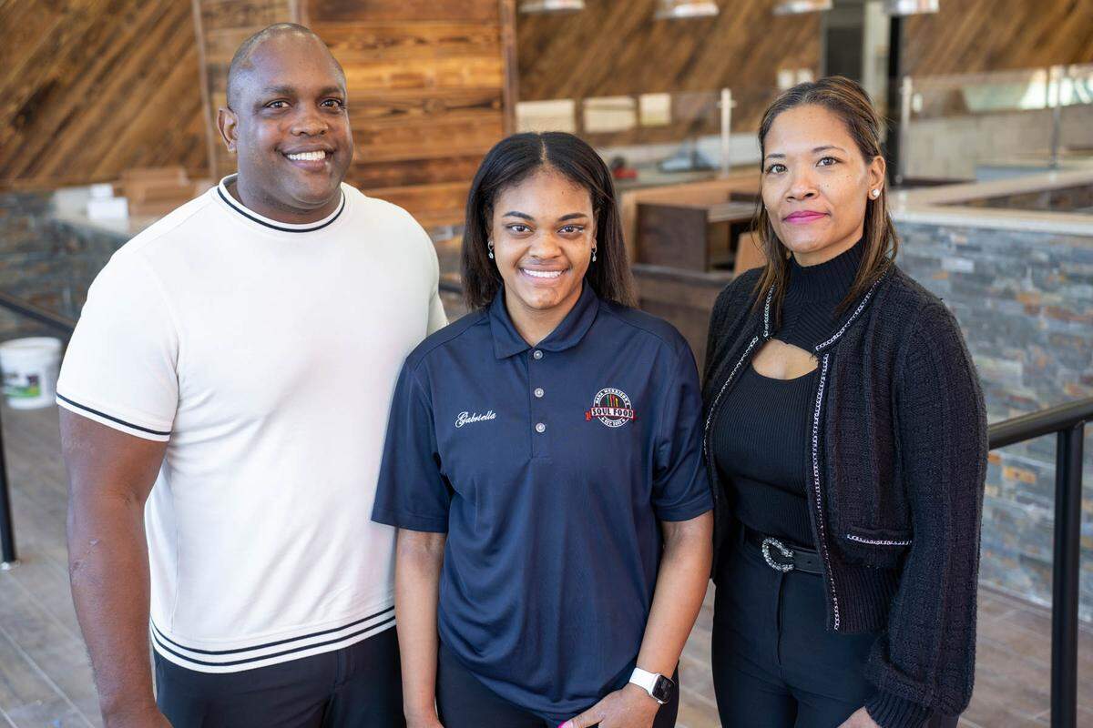 Shawn Morrison, Gabby Morrison and Kiana Morrison at the new Nana Morrison’s Soul Food location in northwest Charlotte.