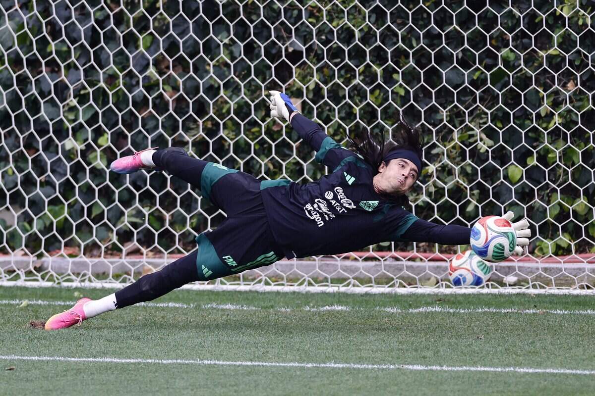 Mexico's goalkeeper Carlos Acevedo dives for the ball during a training session ahead of the FIFA 2026 World Cup at Centro de Alto Rendimiento in Mexico City on June 6, 2026. (Photo by Rodrigo Oropeza / AFP via Getty Images)