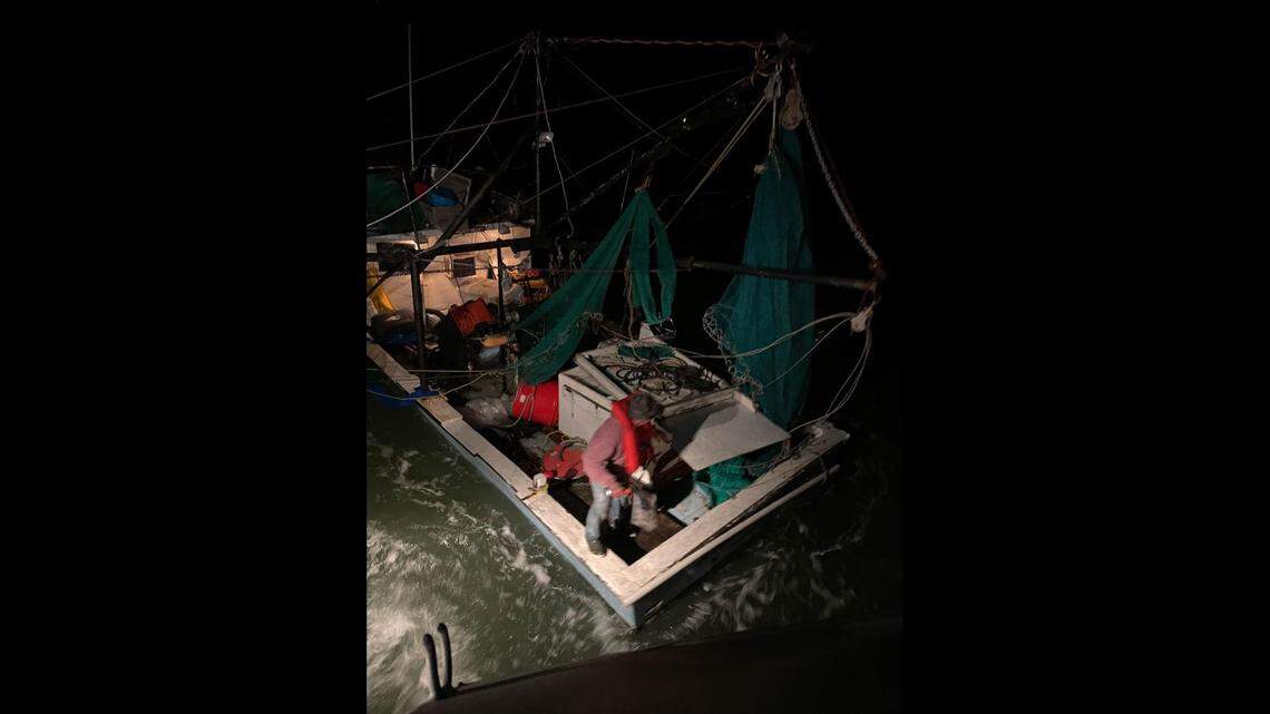 Two fishermen had to jump into chilly Pamlico Sound waters as their boat sank. A Coast Guard crew rescued them