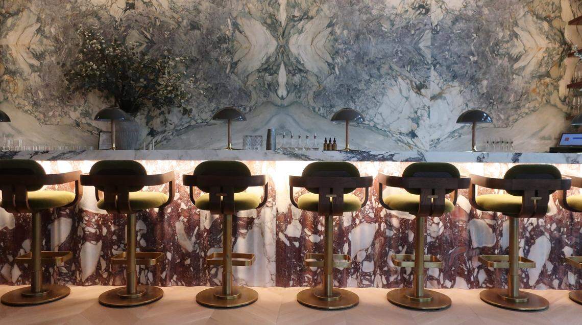 Stools line the bar at Albertine.