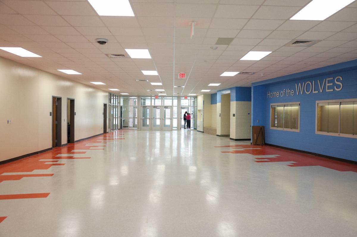 The entrance to Ballantyne Ridge, a new high school that is opening in CMS this year, will have cafe tables that align with outlets and internet ports for students to have alternate working space.