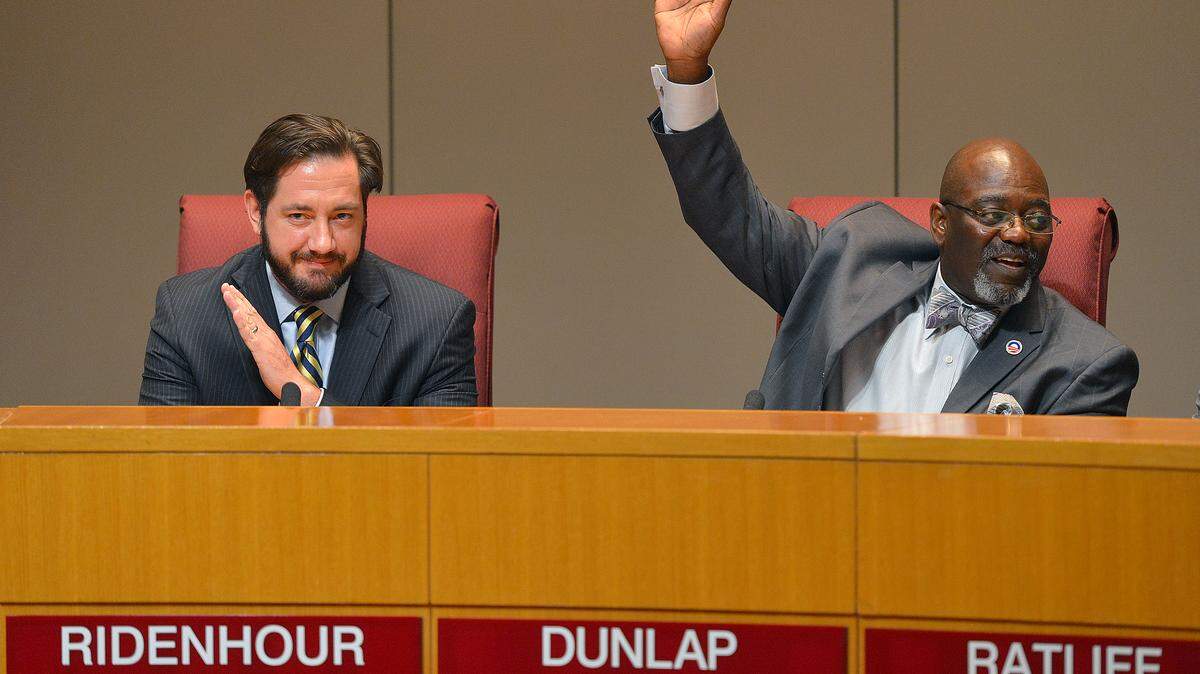 George Dunlap, right, is the new chairman of the Mecklenburg Board of County Commissioners.