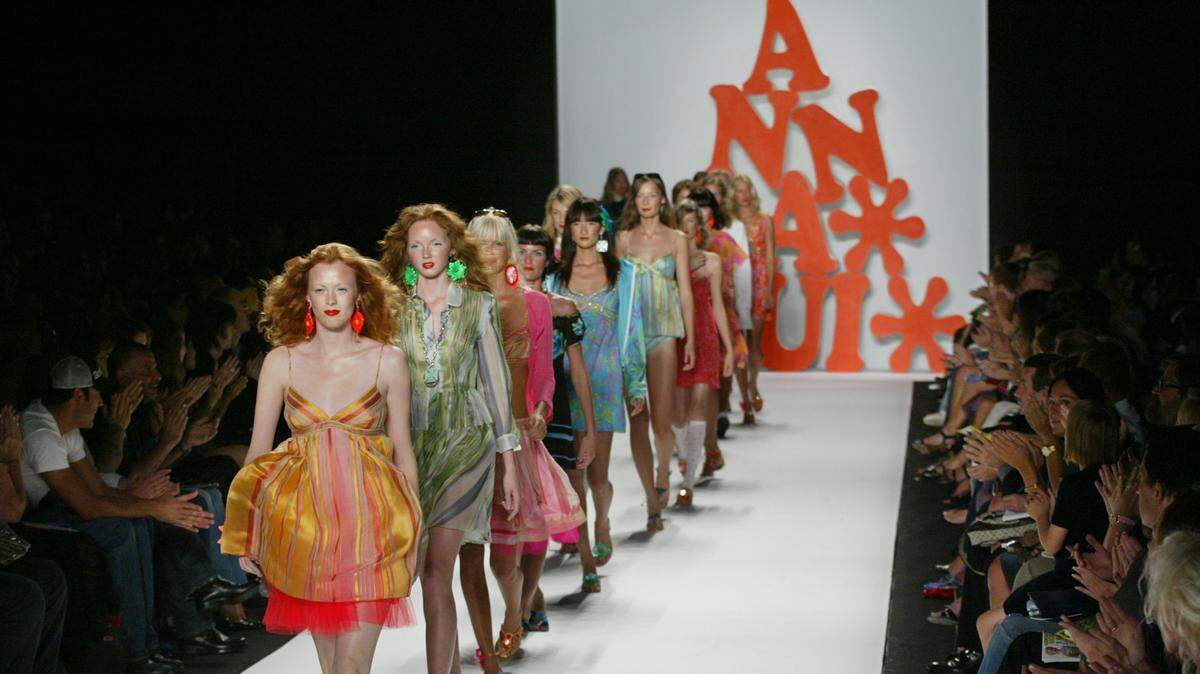 “The World of Anna Sui,” will bring more than 100 looks from Anna Sui’s archive to Charlotte. Shown here are models wearing Sui’s spring 2004 collection on a runway in New York’s Bryant Park.