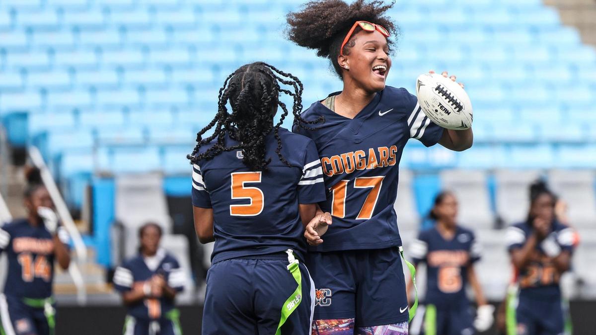 Chambers players celebrate a touchdown against Butler during the first championship game at the Bank of America Stadium in Charlotte, N.C., on Sunday, May 15, 2022.