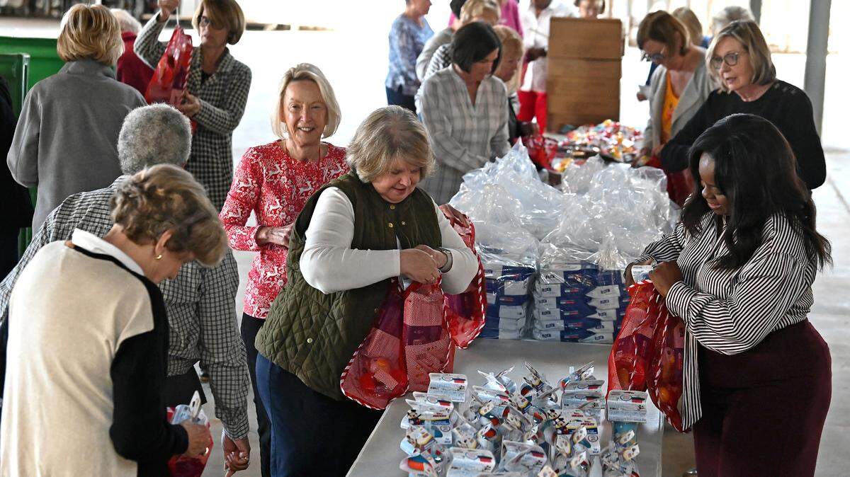 The Salvation Army of Greater Charlotte’s annual Angel Tree program has begun. It provides toys for children in need, and the Observer’s Empty Stocking Fund covers additional needed expenses. Seen here, the Salvation Army Women’s Auxiliary group met for a stocking-stuffing event Nov. 10.