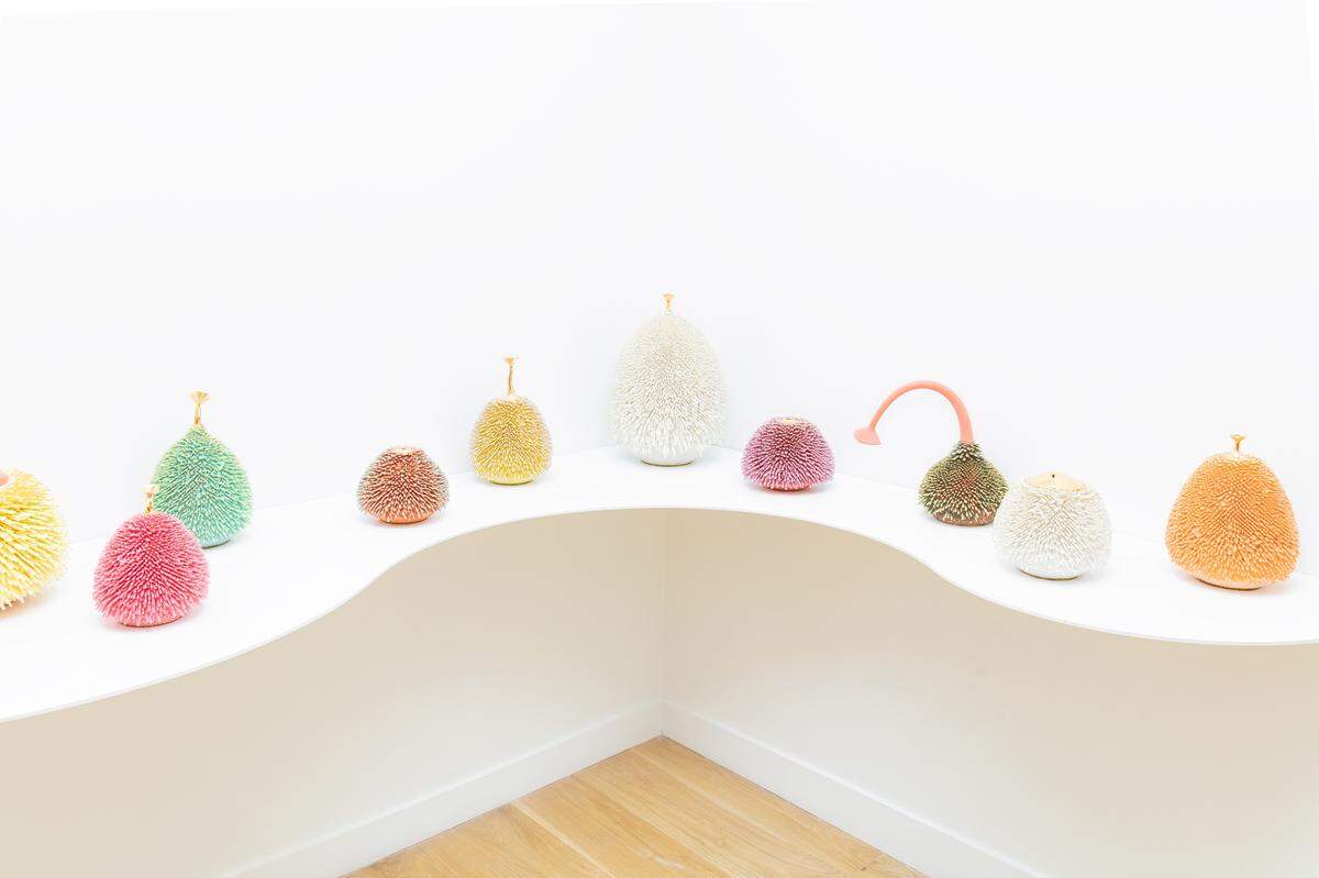 A group of ceramic sculptures from the series “Accretions” are on display at the Haas Brothers exhibit at SOCO Gallery.