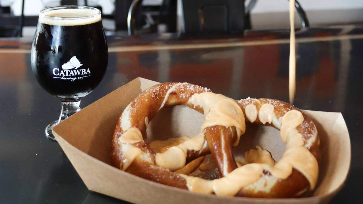 Order a pretzel with beer cheese to accompany your craft beer at Catawba Brewing.