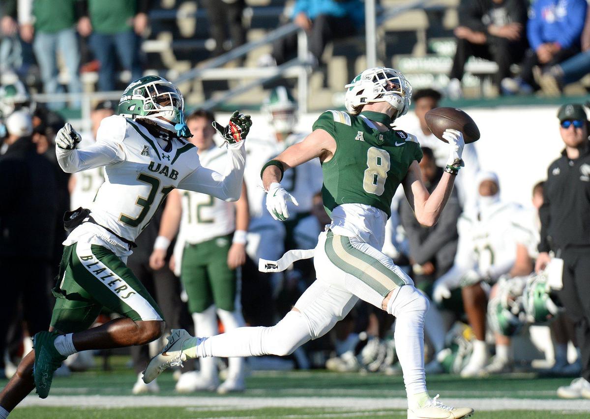 A long pass to Charlotte’s #8, Sean Brown falls just off his hands in the first quarter. Following a win last week against Florida Atlantic under interim coach, Tim Brewster, the Charlotte 49ers football team wrapped up their season on Senior Day at home against the UAB Blazers on Saturday, Nov. 30, 2024. Charlotte trailed UAB 14-13