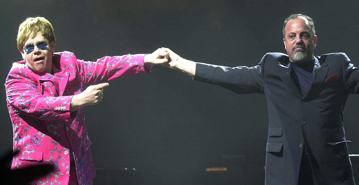 David T. Foster III's April 2001 photo of Elton John and Billy Joel prior to the start of their "Face to Face" concert stop at the old Charlotte Coliseum.