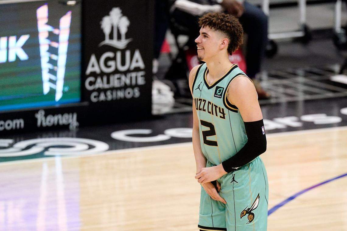 Charlotte Hornets guard LaMelo Ball holds his right wrist after breaking it on March 20th against the L.A. Clippers. It is likely Ball will miss the final 31 games of his rookie NBA season.