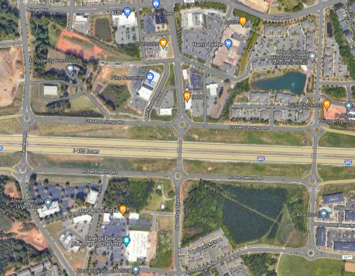 This aerial shows the vision planned by Warren Burgess in the 1990s to have more a street grid network off of Interstate 485 in north Charlotte with roundabouts.