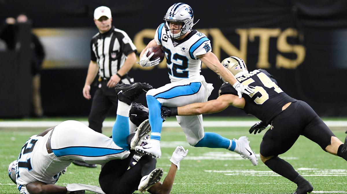 Carolina Panthers running back Christian McCaffrey (22) runs past New Orleans Saints outside linebacker Kiko Alonso (54) in the first half at the Mercedes-Benz Superdome in New Orleans, La on Sunday, November 24, 2019. The Saints led 17-15, at halftime.