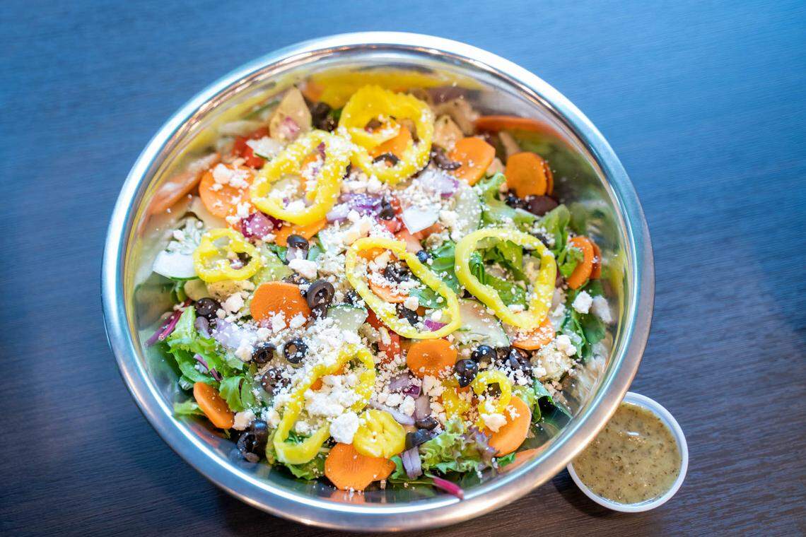 There are no pre-set salad options at Salata. But this Greek salad was put together with feta cheese, banana peppers, black olives, tomatoes, cucumbers, carrots, red onions and fresh herb vinaigrette on the side.
