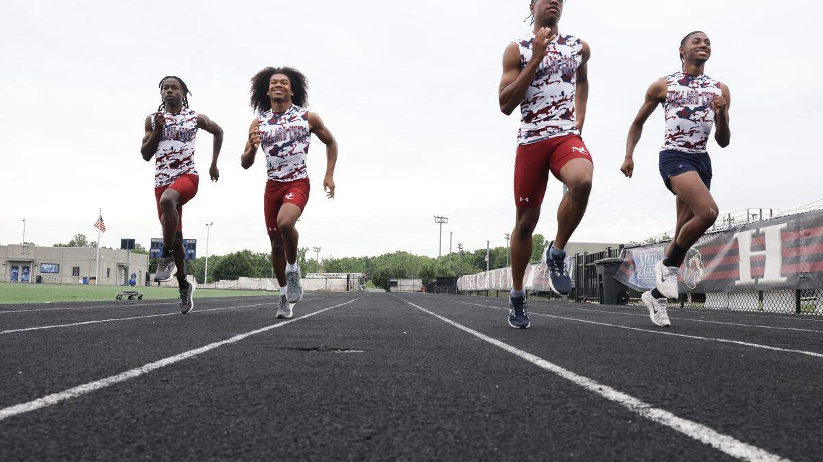 From left, Josiah Vaden, Mason Kelley, Nyan Brown and Roderick Orr run on the track at Mallard Creek High School in Charlotte on Monday, May 11, 2026.