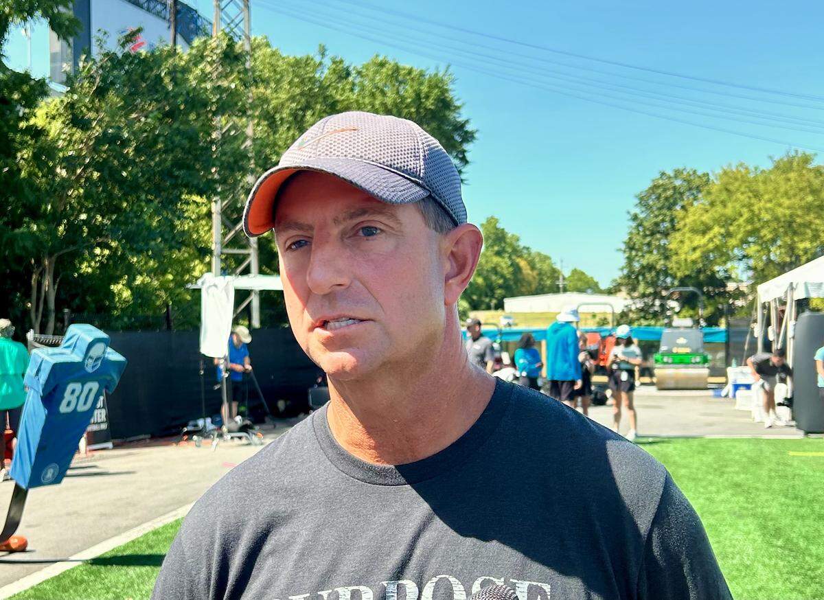 Clemson head football coach Dabo Swinney took a day off from his regular job to come see one of his old stars, Hunter Renfrow, practice with Carolina at the Panthers training camp on Monday, July 28, 2025.