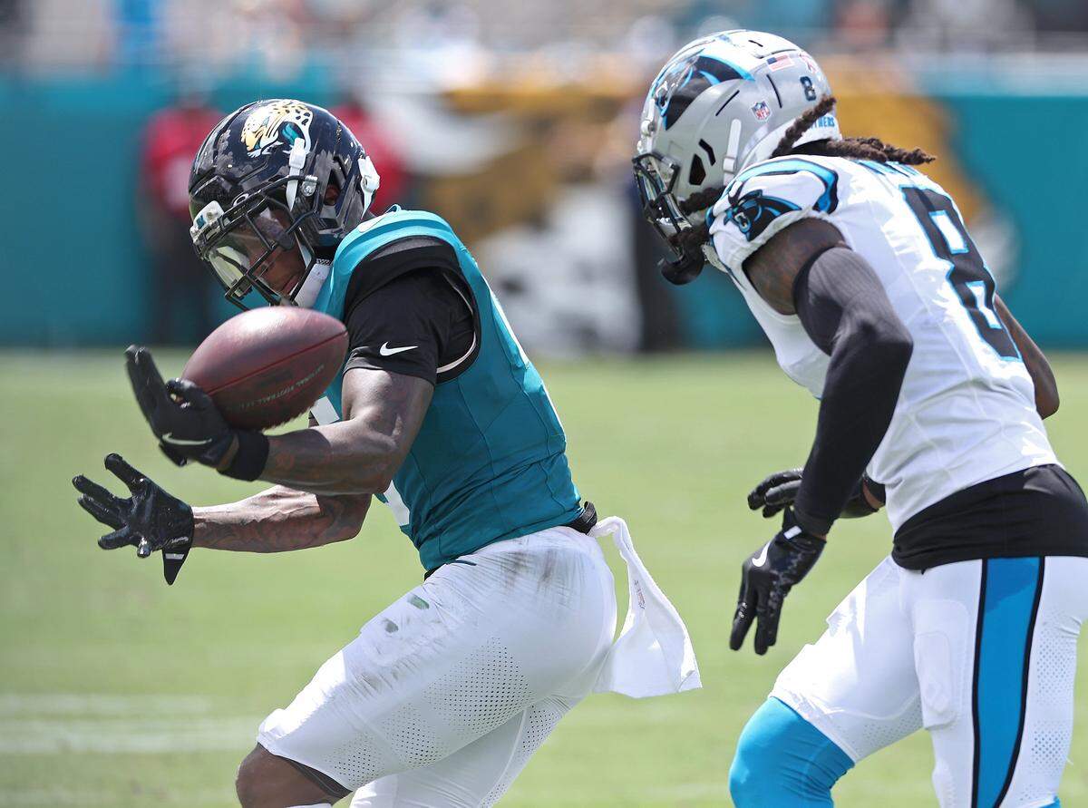 Jacksonville Jaguars wide receiver Dyami Brown, left, is unable to make a pass reception as Carolina Panthers cornerback Jaycee Horn, right, chases during action on Sunday, September 7, 2025 at Everbank Stadium in Jacksonville, Florida.