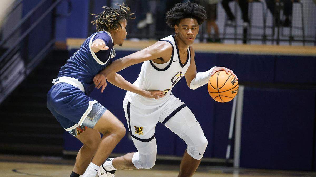 Carmel Christian’s Jaeden Mustaf (3) dribbles past Concord Academy’s Isaiah Tate (3) during a game at Carmel Christian in Matthews, N.C., Tuesday, Nov. 22, 2022. Carmel Christian beat Concord Academy 59-52