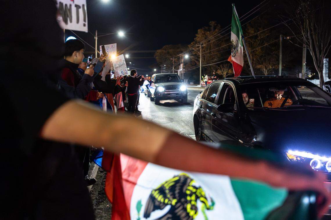 Protesters gather outside of Manolo’s Bakery to protest ICE and Border Patrol in Charlotte, N.C., on Wednesday, November 20, 2025.