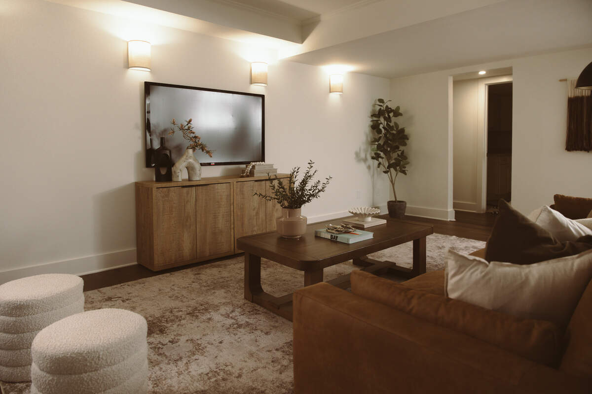 The home has a spacious primary suite, flexible bonus space and a finished lower level with a large family room, bedroom and full bathroom, its listing states.