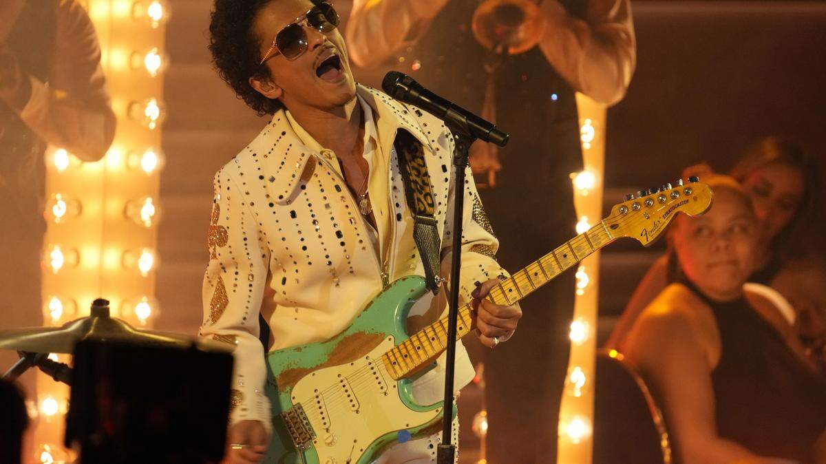 Bruno Mars performs “777” as part of Silk Sonic during the 64th Annual Grammy Awards in Las Vegas in April of 2022. The tour did not invite media to photograph Mars’s concert at Bank of America Stadium on Wednesday night.