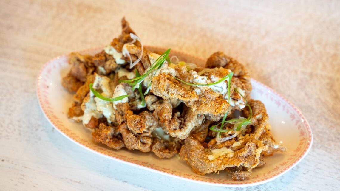 Leah & Louise’s Southern-inspired cuisine includes items such as its River Chips, which are fried chicken skins served with granch sauce.