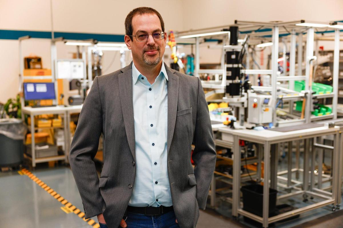 Christian Schilling stands in the manufacturing area of Neugart corporate offices in Charlotte. Neugart moved to the region in 2015 and is part of a number of foreign businesses that call the region home.