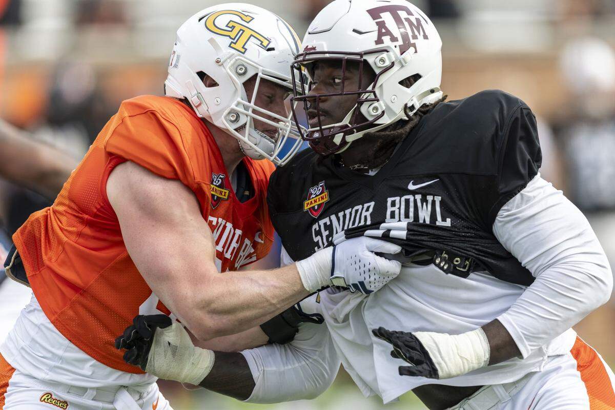 Jan 28, 2025; Mobile, AL, USA; American team tight end Jackson Hawes of Georgia Tech (87) spars with American team defensive lineman Shemar Stewart of Texas A&M (14) during Senior Bowl practice for the American team at Hancock Whitney Stadium. Mandatory Credit: Vasha Hunt-Imagn Images