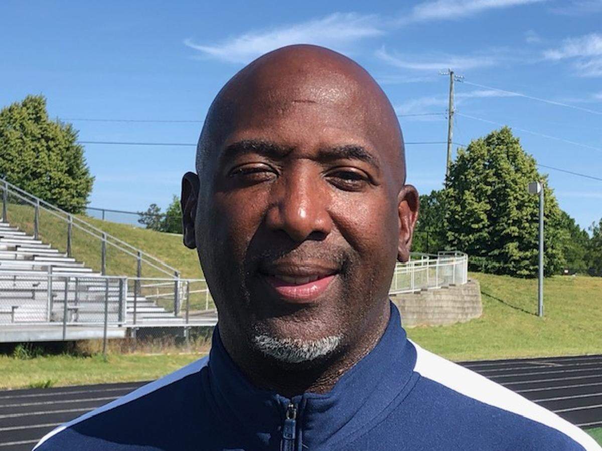 Mallard Creek track coach Samuel Willoughby