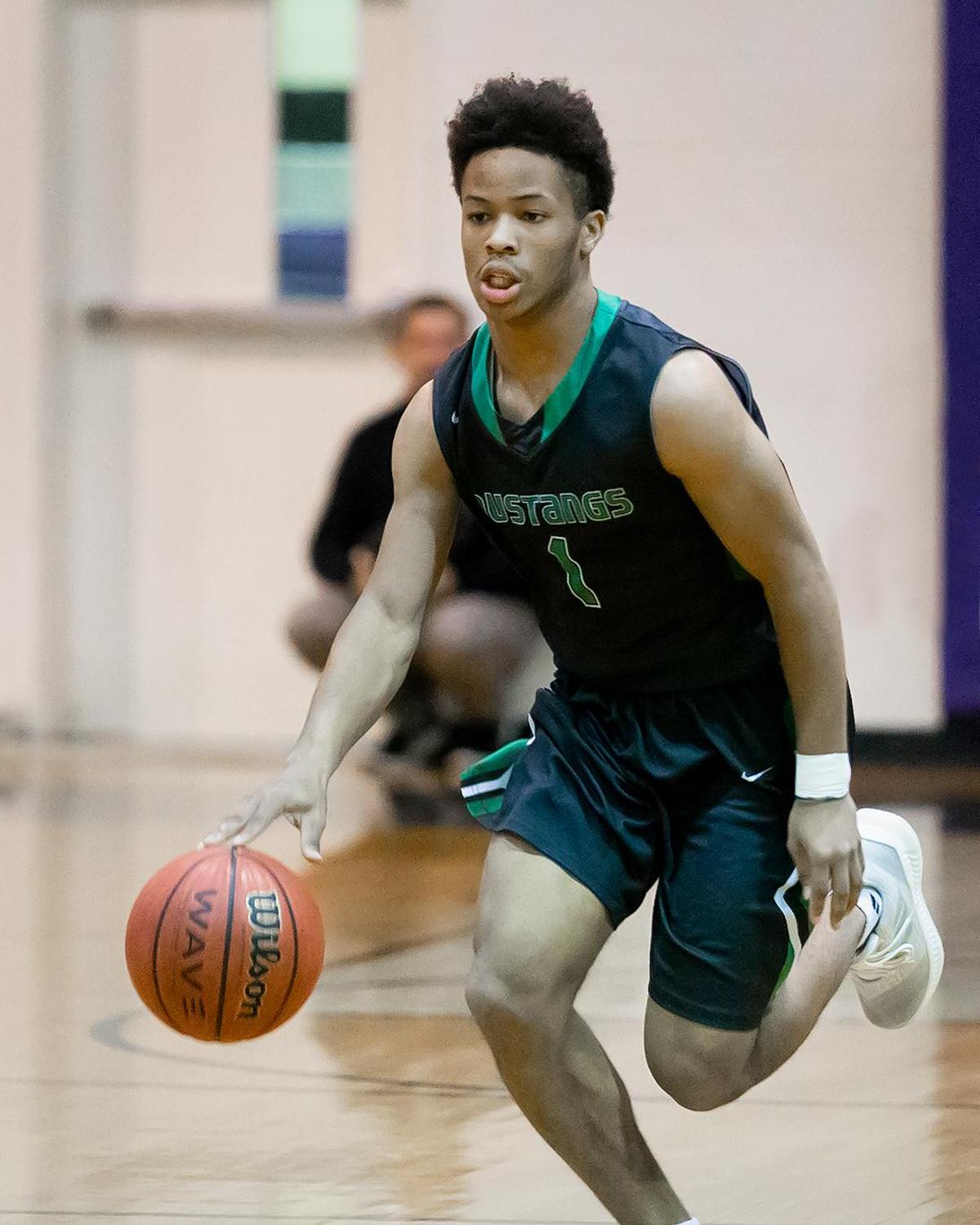 Myers Park Jacob Newman (1) brings the ball front court during late 1st half action.