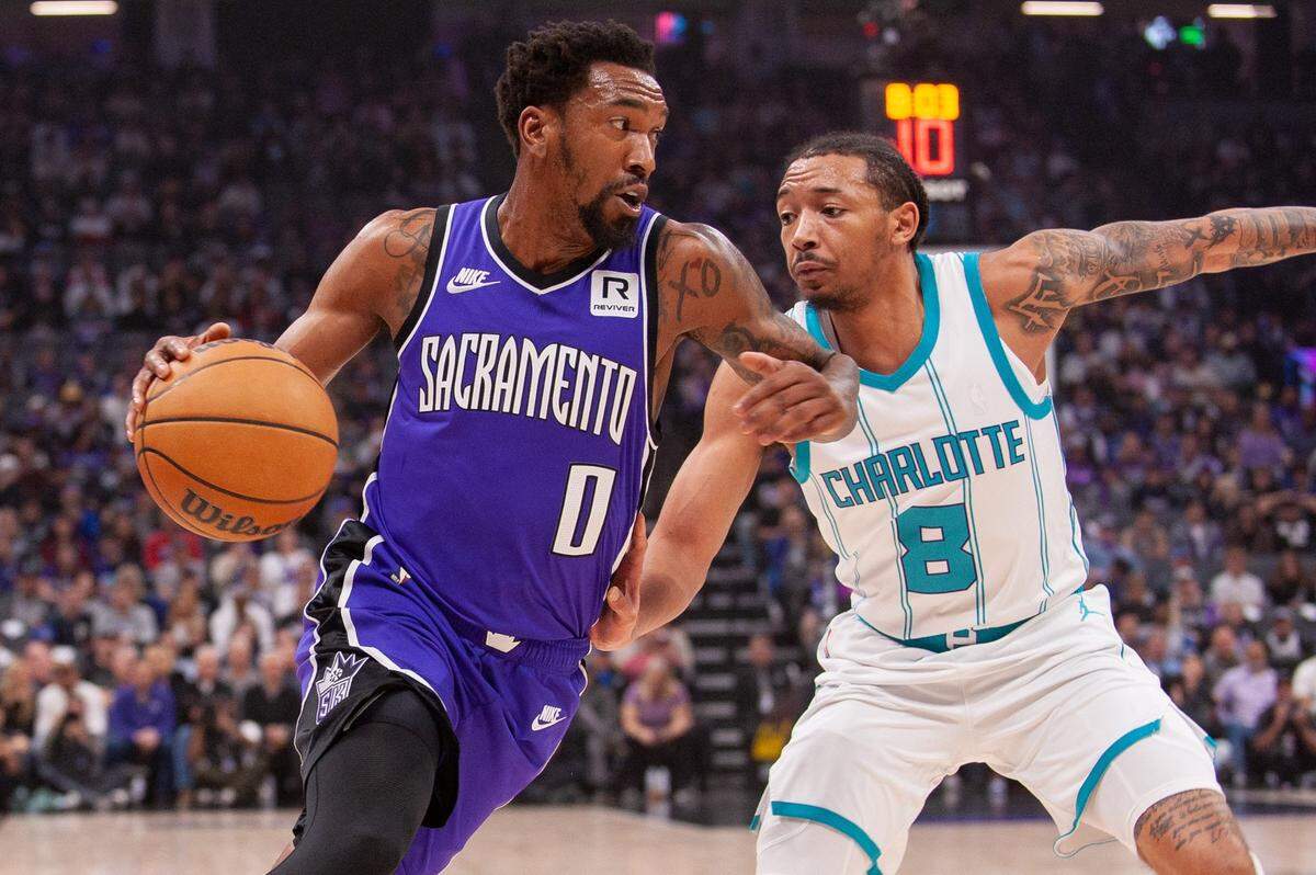 Sacramento Kings guard Malik Monk (0) drives to the basket during the first quarter against the Charlotte Hornets at Golden 1 Center. 