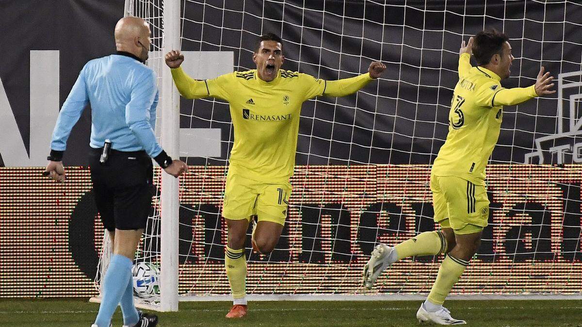 Former Nashville SC forward Daniel Ríos, center, has been acquired by Charlotte FC.