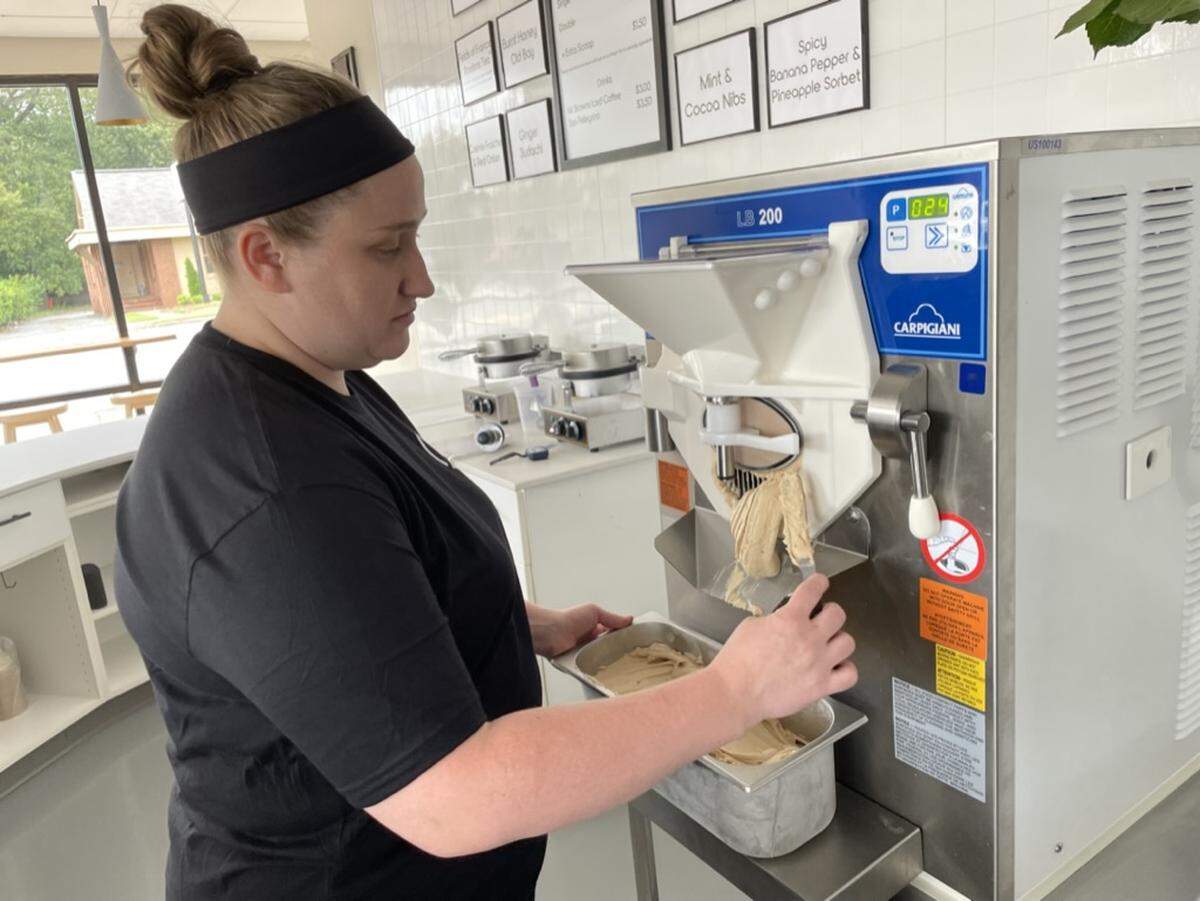 Cold Hearted Gelato owner Elinn Hesse is photographed in 2022 making the Red Miso Toasted Hazelnut flavor.