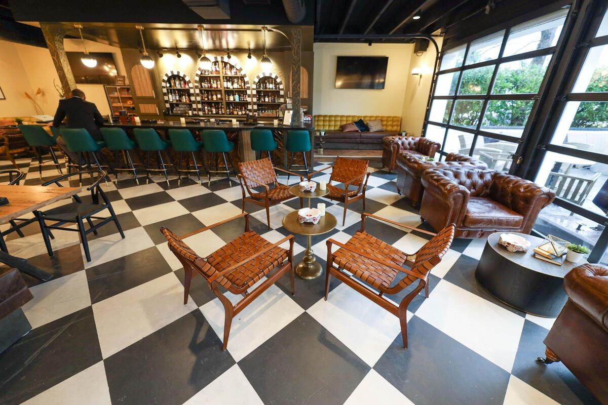 The Vintage Whiskey & Cigar Bar has seating in the main bar area, out on the patio and in two private rooms in the back.
