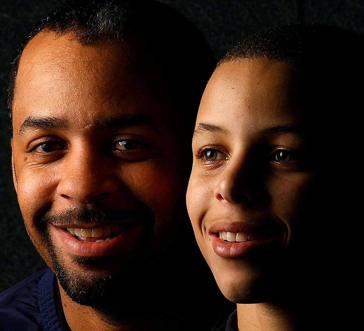 In 2004, a 15-year-old Steph Curry (right) posed with his father, Dell, for The Charlotte Observer.