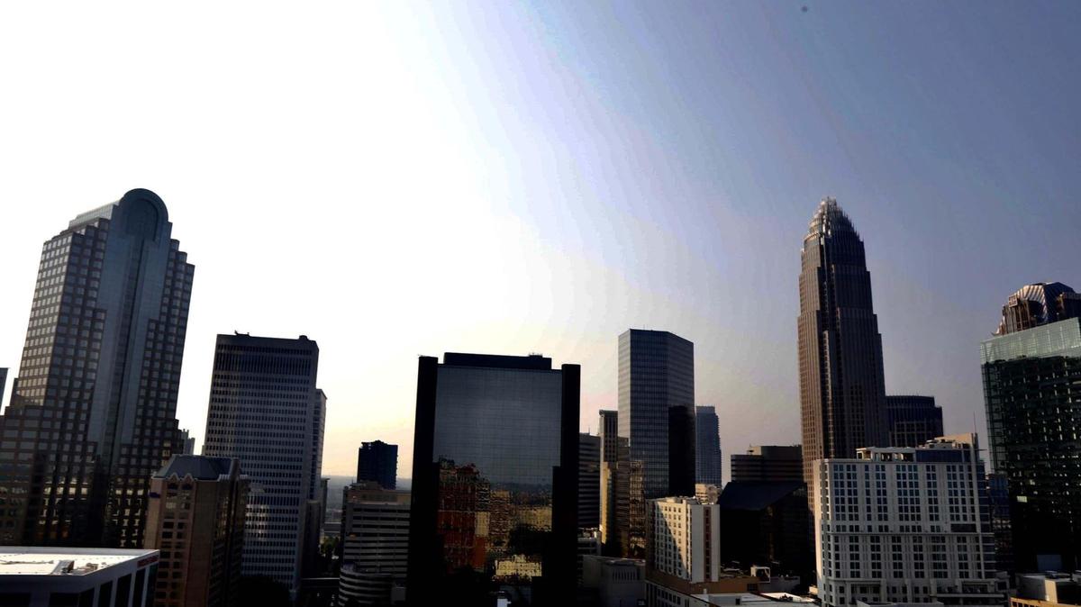 A hazy sky is seen in uptown Charlotte on Wednesday July 21, 2021. Charlotte region is under a Code Orange air quality alert as smoke from the wildfires in Western states makes its way east.