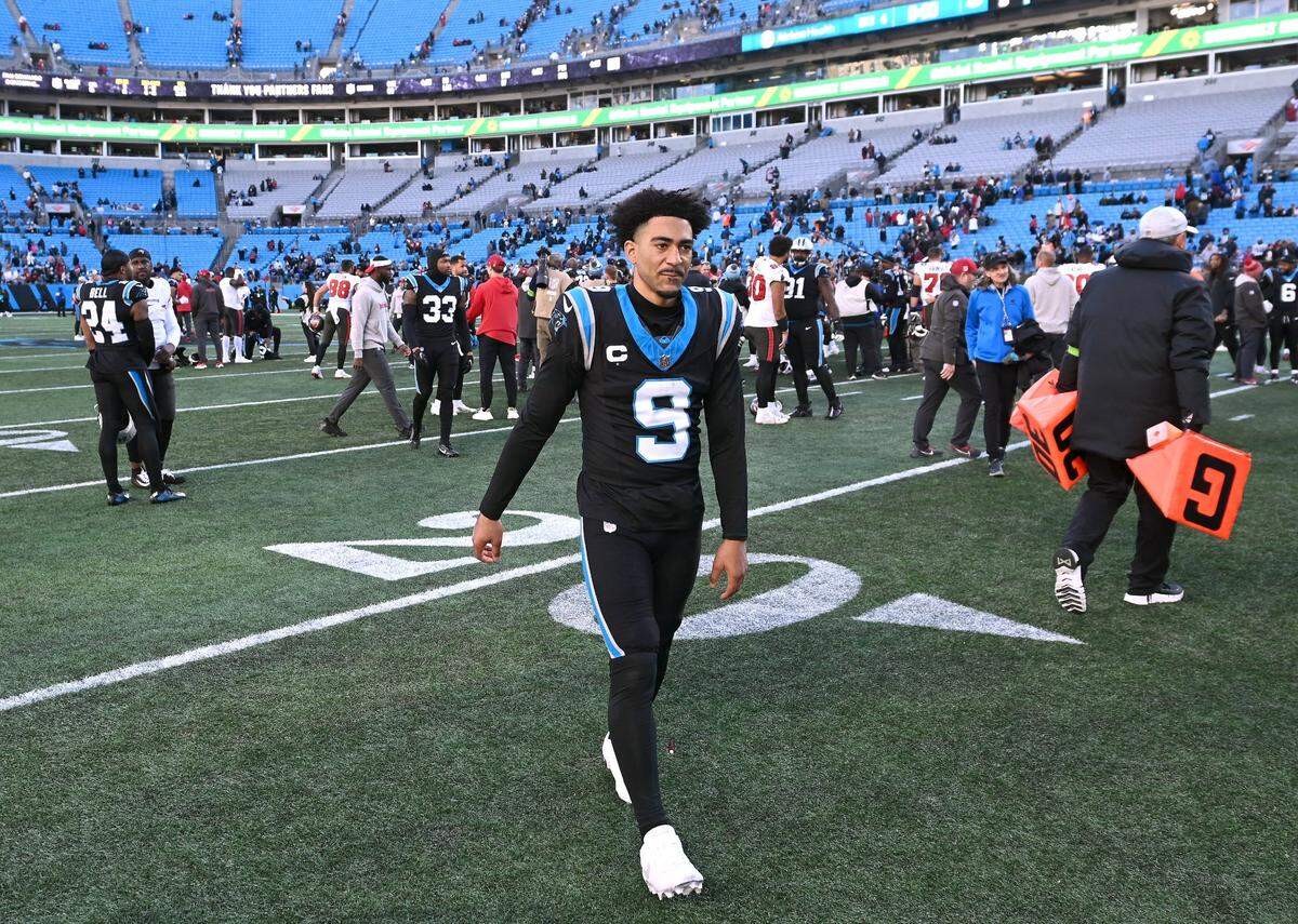 Carolina Panthers quarterback Bryce Young walks off the field following the team’s 9-0 loss to the Tampa Bay Buccaneers at Bank of America Stadium in Charlotte, NC on Sunday, January 7, 2024. In a terrible season offensively, the Panthers were shut out in each of their final two games.