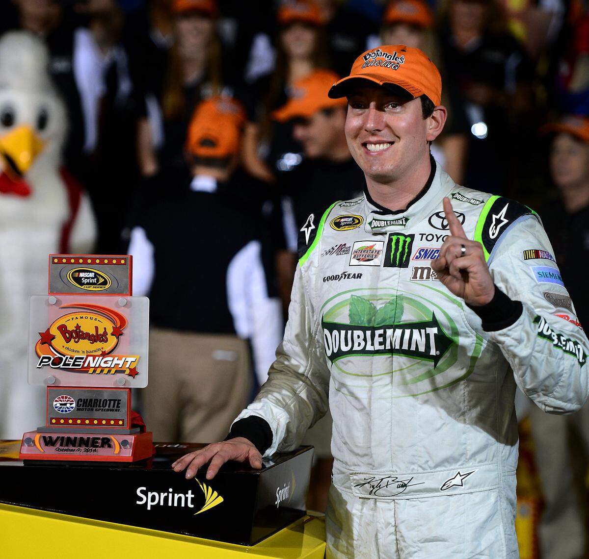 NASCAR Sprint Cup Series driver Kyle Busch (18) celebrates his winning the Bojangles Pole Night for the Bank of America 500 for at Charlotte Motor Speedway on Thursday, October 9, 2014.
