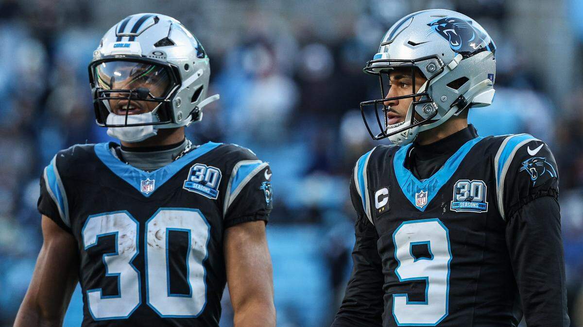 Panthers runningback Chuba Hubbard, left, and quarterback Bryce Young, during the game at Bank of America Stadium in Charlotte, NC on Sunday, December 22, 2024.