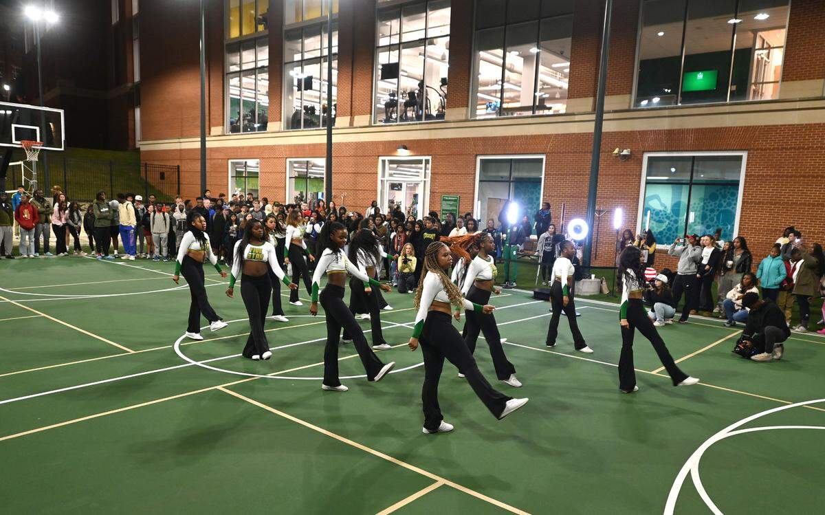 The Charlotte 49ers Five Star cheerleading team entertain the fans during the men’s and women’s basketball fan fest at the University Recreation Center on the campus of UNC Charlotte on Thursday, October 17, 2024.
