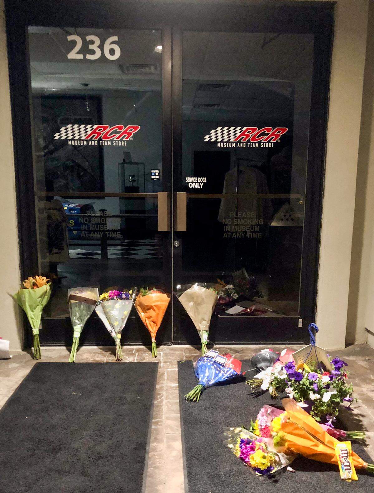 NASCAR fans have left bouquets of flowers and small bags of M&M’s with sympathy letters outside the door of Richard Childress Racing in Welcome, NC following the death of driver Kyle Busch. Busch passed away from an illness on Thursday, May 21, 2026.