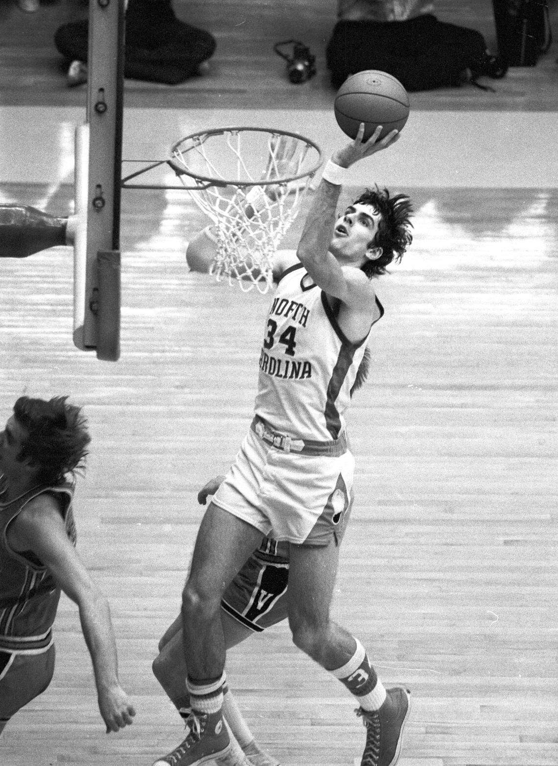 UNC’s Bobby Jones drives to the basket against Virginia in a 1974 game in Chapel Hill. That was the same year Jones was involved in two memorable wins against Duke.