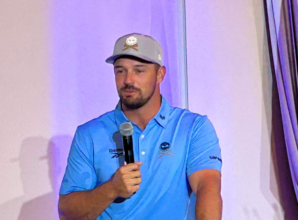 Professional golfer Bryson DeChambeau speaks to a crowd of close to 400 people at the Hood Hargett Breakfast Club on Tuesday, May 13, 2025, in Charlotte. DeChambeau will compete in the PGA Championship at Quail Hollow Club beginning Thursday.