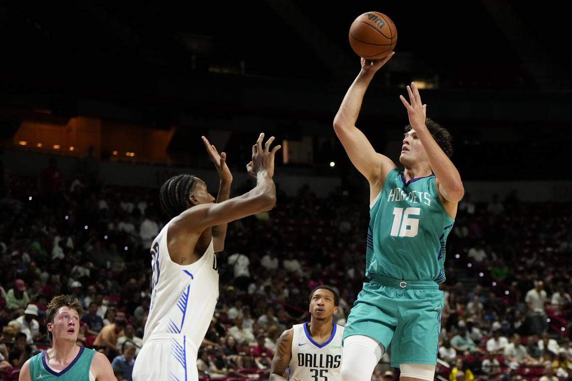 PJ Hall (16) shoots the ball against Dallas Mavericks center Jamarion Sharp (33) during the second half of a NBA basketball game at the Thomas & Mack Center.